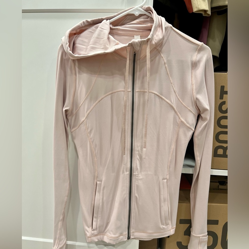 Blush colored Lululemon jacket with hoodie
